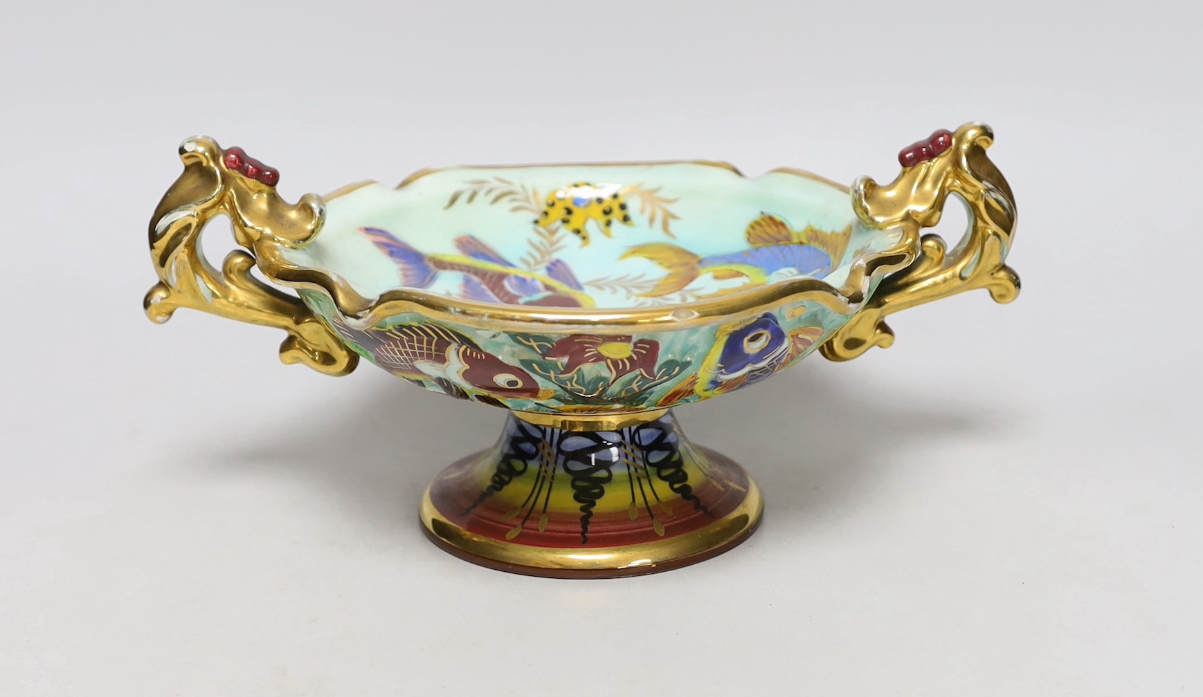 A French tazza with two handles, vibrant colours and a gilt and enamel box and cover, Tarzan 30cms wide
